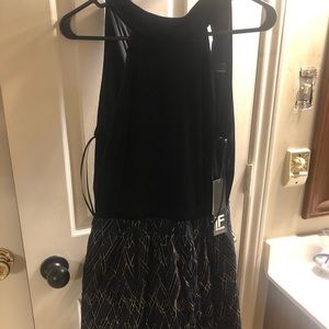Leslie Fay cocktail dress. Velvet bodice, sparkly knee length skirt. Size 4 NWT